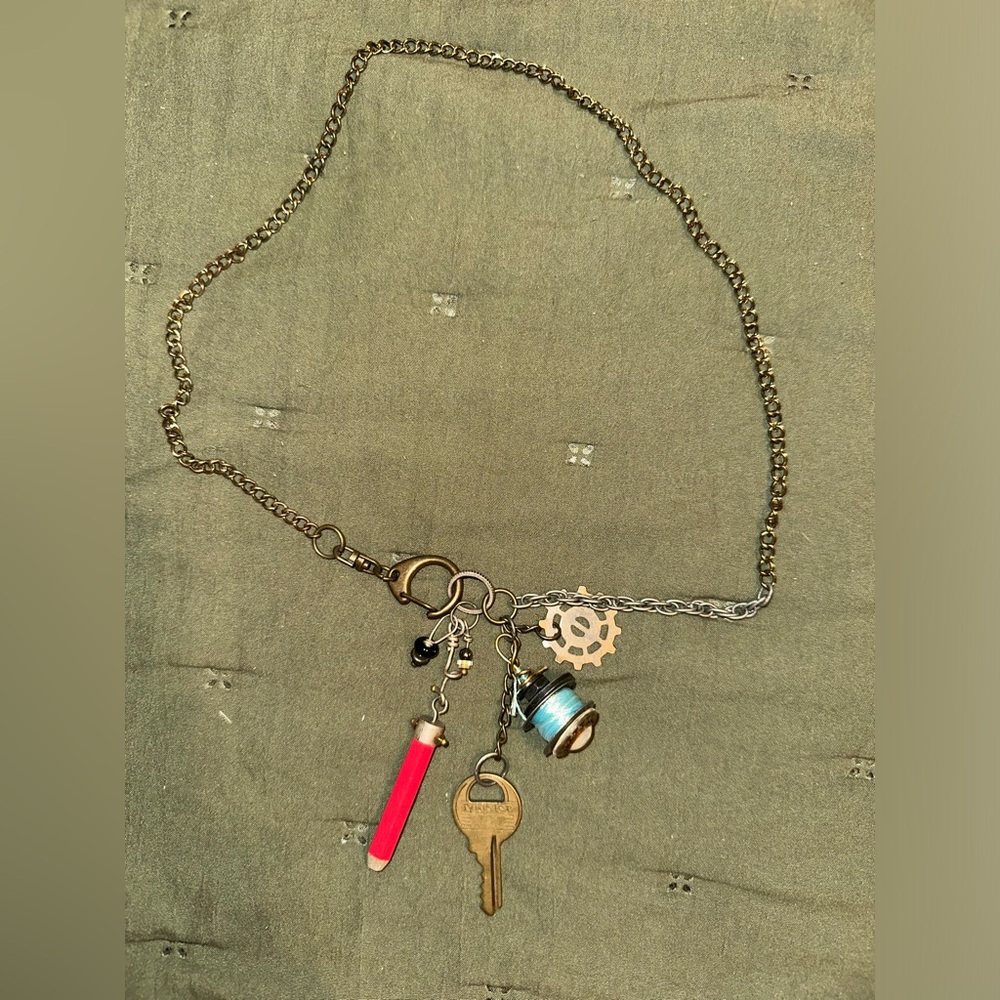 Mixed metal trinket necklace